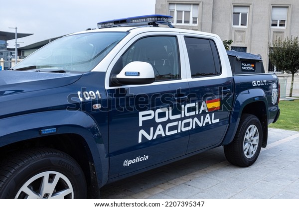 La Coruna,\
Spain; september 23, 2022: Policia Nacional sign on the side of\
Spanish National Police Corps vehicle. Policia nacional is the\
national civilian police force of\
Spain