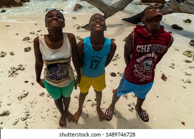 LA DIGUE, SEYCHELLES - AUGUST 25 2019 - Young Islands Boys Pose For Photographer. They Are Happy And Very Friendly People.