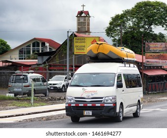 La Fortuna, Costa Rica - July 11, 2019: Toyota Van Transporting An Inflatable Raft. 