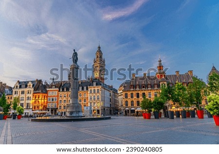 La Grand Place square in Lille city center, historical monument Flemish mannerist style buildings, Column of Goddess, Vieille Bourse in the evening, French Flanders, Nord department, Northern France