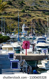 LA HERRADURA, SPAIN - MAY 26, 2018 A beautiful marina with luxury yachts and motor boats in the tourist seaside town of La Herradura