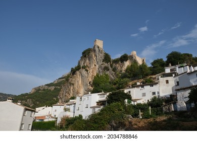 La Iruela village with typical Andalusian white houses and with the castle on top of the rocky mountain. located in the foothills of the Sierra de Cazorla and overlooking the Guadalquivir valley