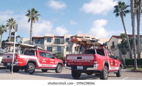 La Jolla, California USA - 23 Nov 2020: Lifeguard Red Pickup Truck, Life Guard Auto By Beach. Rescue Pick Up Car On Coast For Surfing Safety, Lifesavers 911 Vehicle. Palm Tree On San Diego City Street