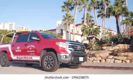 La Jolla, California USA - 23 Nov 2020: Lifeguard Red Pickup Truck, Life Guard Auto By Beach. Rescue Pick Up Car On Coast For Surfing Safety, Lifesavers 911 Vehicle. Palm Tree On San Diego City Street