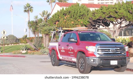 La Jolla, California USA - 23 Nov 2020: Lifeguard Red Pickup Truck, Life Guard Auto By Beach. Rescue Pick Up Car On Coast For Surfing Safety, Lifesavers 911 Vehicle. Palm Tree On San Diego City Street