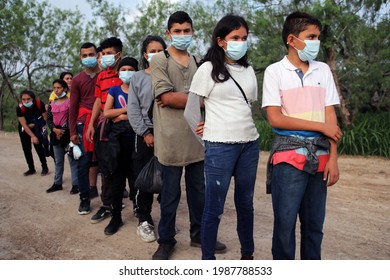 La Joya, TX, USA - May 26, 2021:  A  Group Of Unaccompanied Central American Minors Who Crossed The Rio Grande River Illegally To Request Asylum Wait To Be Processed By The Border Patrol.