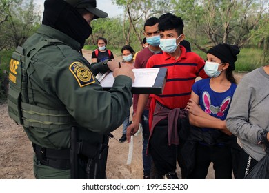 La Joya, TX, USA - May 26, 2021:  A Border Patrol Agent Processes  Unaccompanied Central American  Minors Who Crossed The Rio Grande River Illegally To Request Asylum.