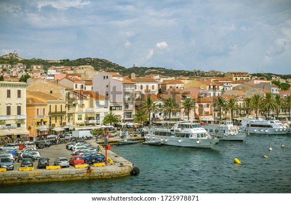 La Maddalena, Italy - August 28, 2019: View on busy\
seafront in La Maddalena on Sardinia in Italy during sunny summer\
day in August 2019