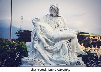 La Pieta statue - The blessed Virgin Mary holding dead Jesus Christ body