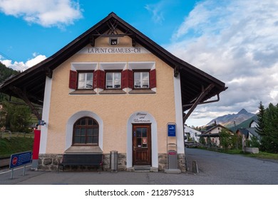 La Punt, Switzerland - September 29, 2021: A building of a local railway station at La Punt Chamues in swiss Engadine, canton Graubunden