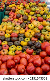 La Quinta CA USA - April 3 2022: Fresh Market Tomatoes In Red, Yellow, And Green