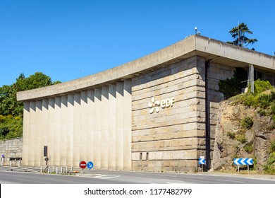 La Richardais, France - June 23, 2018: A Building Of The River Rance Tidal Power Station Run By French Public Electricity Utility Company EDF Near Saint-Malo In Brittany.