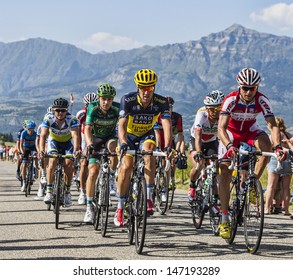 LA ROCHETTE, FRANCE- JUL 16: The peloton pedaling on a plain road after the ascension to Col de Manse in The Alps during the stage 16 of 100 edition of Le Tour de France on July 16 2013 in La Rochette