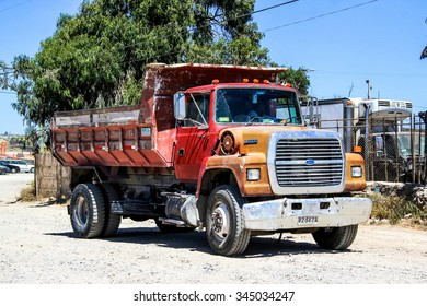 LA SERENA, CHILE - NOVEMBER 19, 2015: Dump truck Ford L8000 at the town street.