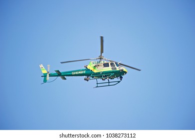 LA VERNE/CALIFORNIA - FEB. 11, 2018: Sheriff Department Airbus AS350 B2 Ecureuil  helicopter flying over Brackett Field Airport on a routine surveillance mission. La Verne, California USA
