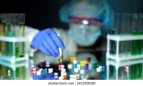 Lab Assistant Analyzing Medication Capsules, Counterfeit Pharmaceuticals, Study