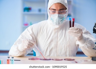 Lab assistant testing blood samples in hospital