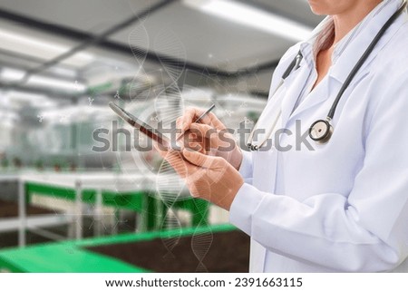 Lab diagnostics laboratory assistant writing DNA molecules.