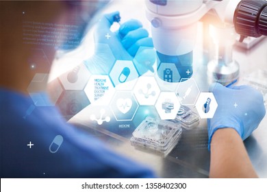 Lab technician checking material by creating chemical reaction with reagents - Shutterstock ID 1358402300