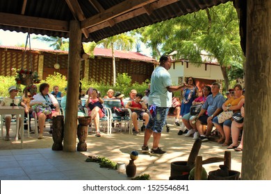 Labadee, Haiti - August 21st 2019: A local tour guide speaks to cruise ship guests on an excursion, about traditional local customs and culture in Haiti.