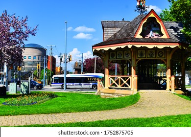 Labatt Brewries Site, With  Bus From Grand River Transit, GRT, Passing Intersection  With Traffic Lights And Buildings In The Background Uptown Waterloo, Ontario, Canada, May 24, 2020. 