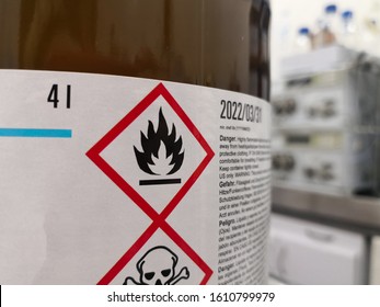 Label Of A Hazardous Chemical In A Scientific Laboratory. Warning Icons On Flammability And Toxicity.