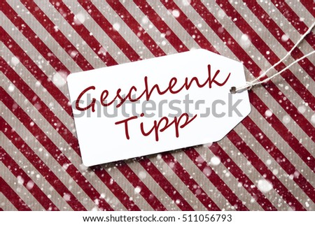 Label, Red Wrapping Paper, Geschenk Tipp Means Gift Tip, Snowflakes