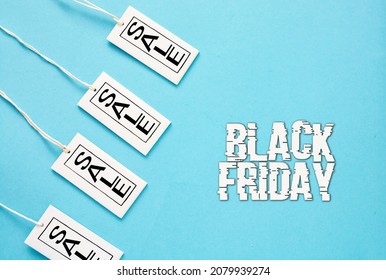 Label Sale Tag With Shopper Paper Bag, Black Friday Or Cyber Monday Shopper - Online Shopping Concept
