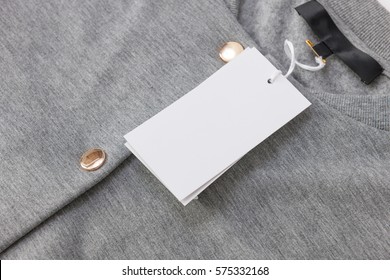 Label and Tag on Gray Bomber with Gold Buttons - Powered by Shutterstock