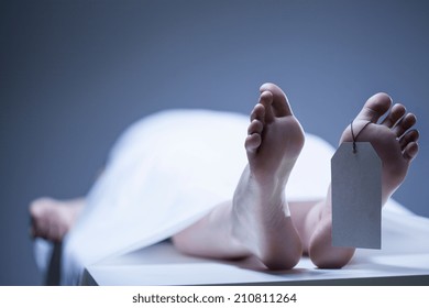 Labeled Remains Of Person Lying In Mortuary