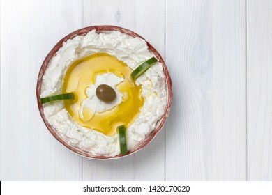 Labneh Cheese With Olive Oil On A Table 