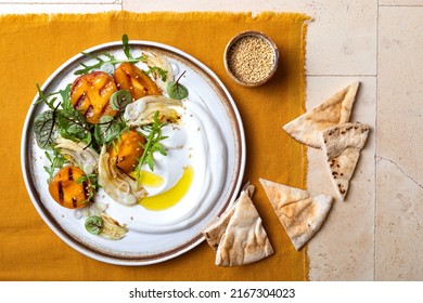 Labneh Middle Eastern Lebanese Cream Cheese Dip. Fennel Apricot Grilled Barbecue Salad With Labneh. Top View, Overhead