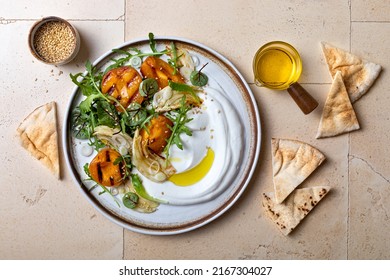 Labneh Middle Eastern Lebanese Cream Cheese Dip. Fennel Apricot Grilled Barbecue Salad With Labneh. Top View, Overhead