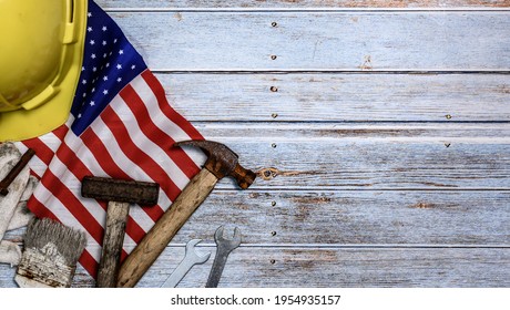 Labor day background and federal holiday. Independence and memorial day in America and USA. Engineer and worker tools with copy space for text. - Shutterstock ID 1954935157