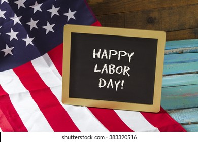 Labor Day Chalk Sign On Blue Wood Background