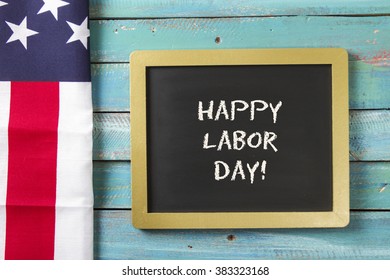 Labor Day Chalk Sign On Blue Wood Background