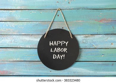 Labor Day Chalk Sign On Blue Wood Background