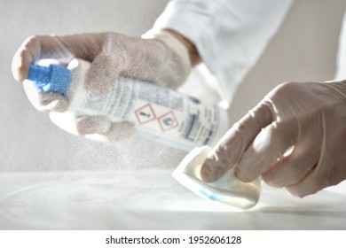 Laboratory Agent Nurse Doctor Cleaning Desinfecting Surface With Desinfection Reagent Spray