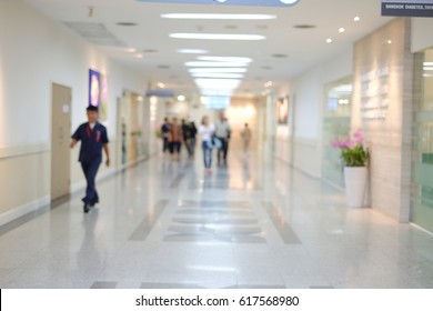 laboratory assistant walking in the hall,unfocused background - Powered by Shutterstock