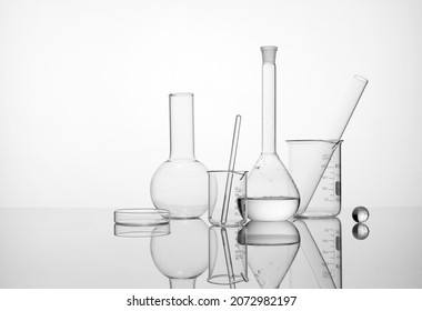 Laboratory equipment beakers and flask with backlight in different group