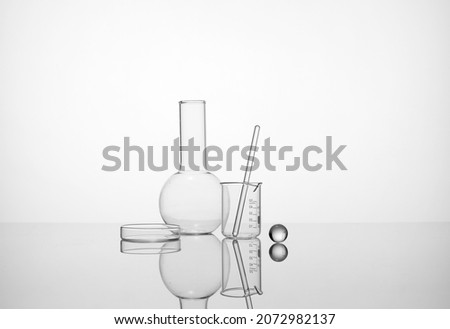 Laboratory equipment beakers and flask with backlight in different group