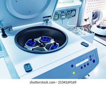Laboratory equipment. Open laboratory centrifuge. White medical centrifuge with digital panel. Device for laboratory research. Modern lab technologies. Medical Research Centrifuge.