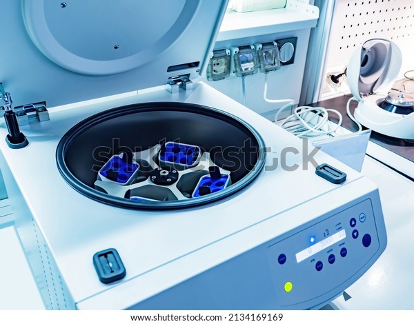 Laboratory\
equipment. Open laboratory centrifuge. White medical centrifuge\
with digital panel. Device for laboratory research. Modern lab\
technologies. Medical Research\
Centrifuge.