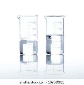 Laboratory Flasks With A Clear Liquid, Isolated