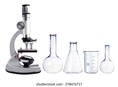 Laboratory metal microscope and empty test tubes isolated on white