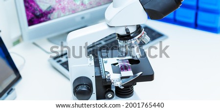 laboratory microscope with the image cells on the monitor