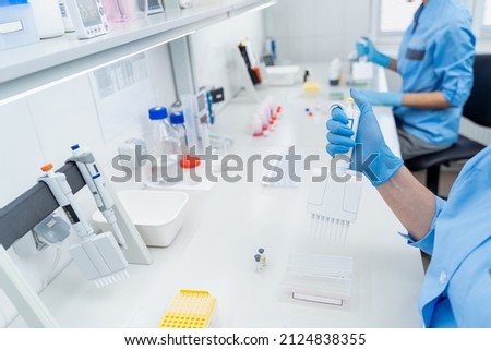 Laboratory research using reagents and equipment