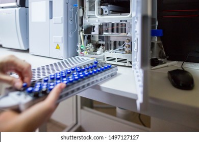 The laboratory scientist prepares samples for download to High-performance Liquid Chromatograph Mass Spectrometr.