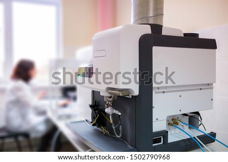 The laboratory scientist work with microwave plasma atomic emission spectrometer (MPAES) for elemental property analysis of material sample in all areas of industry.