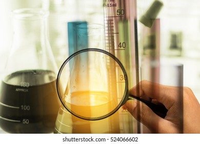 Laboratory Test Tube,Glass Laboratory Chemical Test Tubes With Liquid And Hand Holding Magnifier.Double Exposure